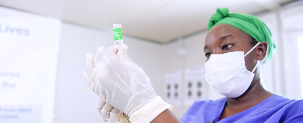 A medical officer in Somalia prepares to administer a dose of COVID-19 vaccine. A medical officer in Somalia prepares to administer a dose of COVID-19 vaccine.